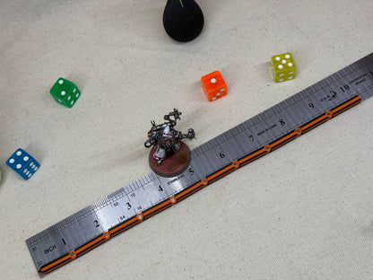 Regla flexible para juegos de escaramuza y wargames
