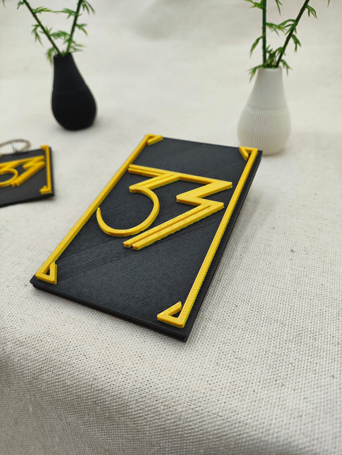 Llavero 3D - Brazalete 33